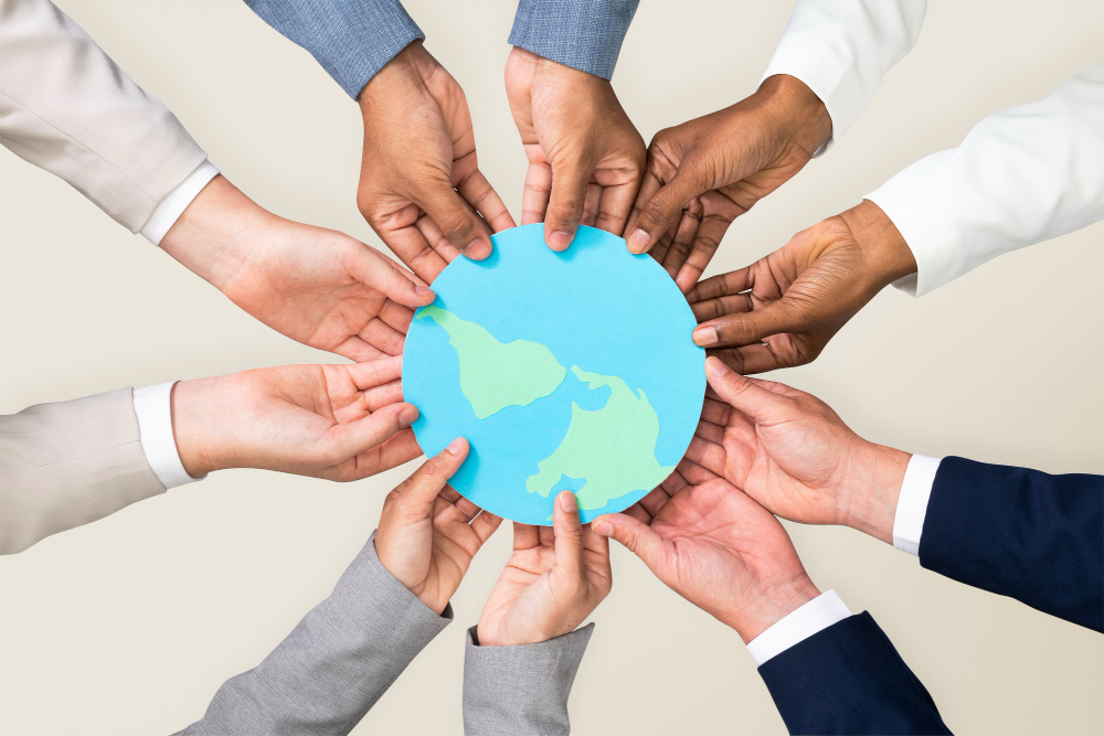 Hands holding earth in a circular motion, a CSR business campaign