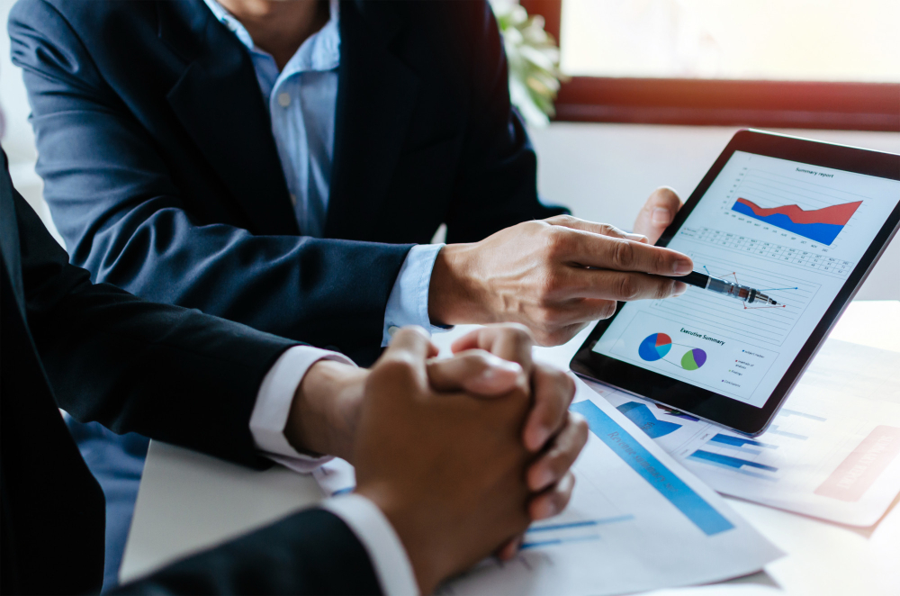 business men, investor team brainstorming and planning about financial statistics chart information and infrastructure
