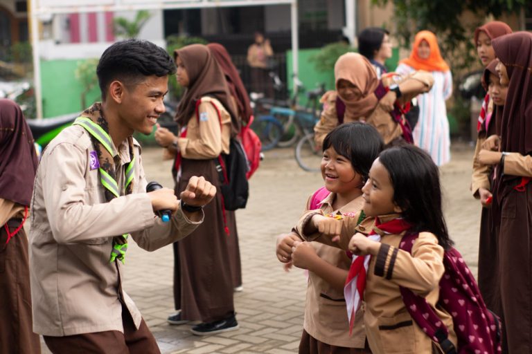 scout trainers students are having fun dancing