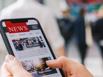 online-news-mobile-phone-close-up-businesswoman-reading-news-articles-smartphone-screen-application-hand-holding-smart-device-mockup-website-newspaper-portal-internet